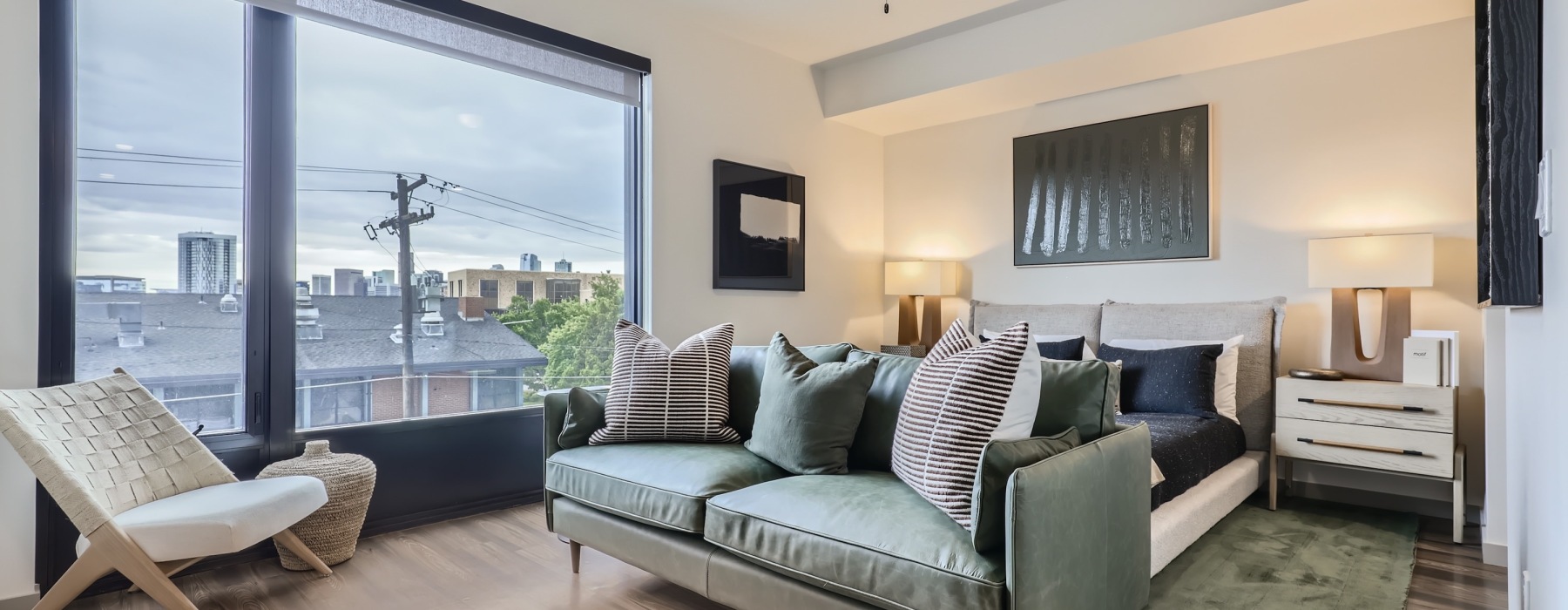 a living room with a couch and a fan